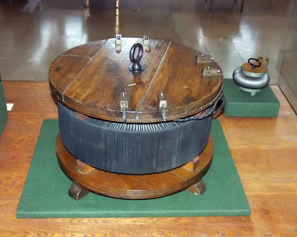 The earliest form of core-type (front) and shell-type (back) transformer