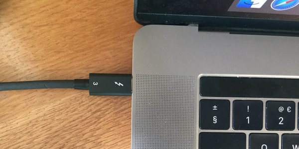 A Thunderbolt cable connected to a Thunderbolt port