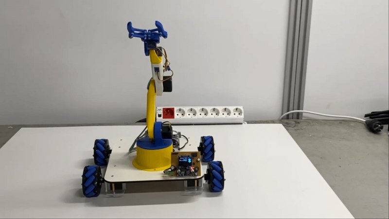 Mecanum wheeled robot arm using STM32 with ESP32