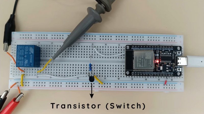 ESP32 driving a relay through an NPN transistor